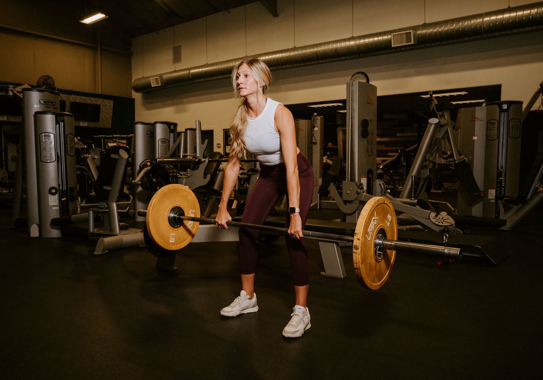 Coach K lifting in the gym